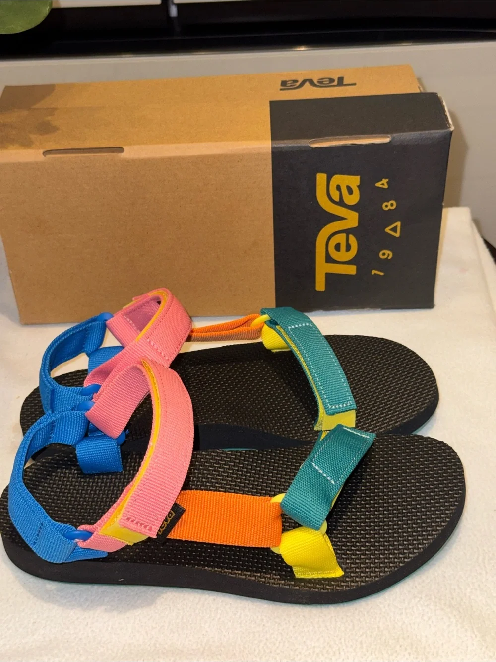 Teva Original Universal sandals in a 90s multi-color pattern